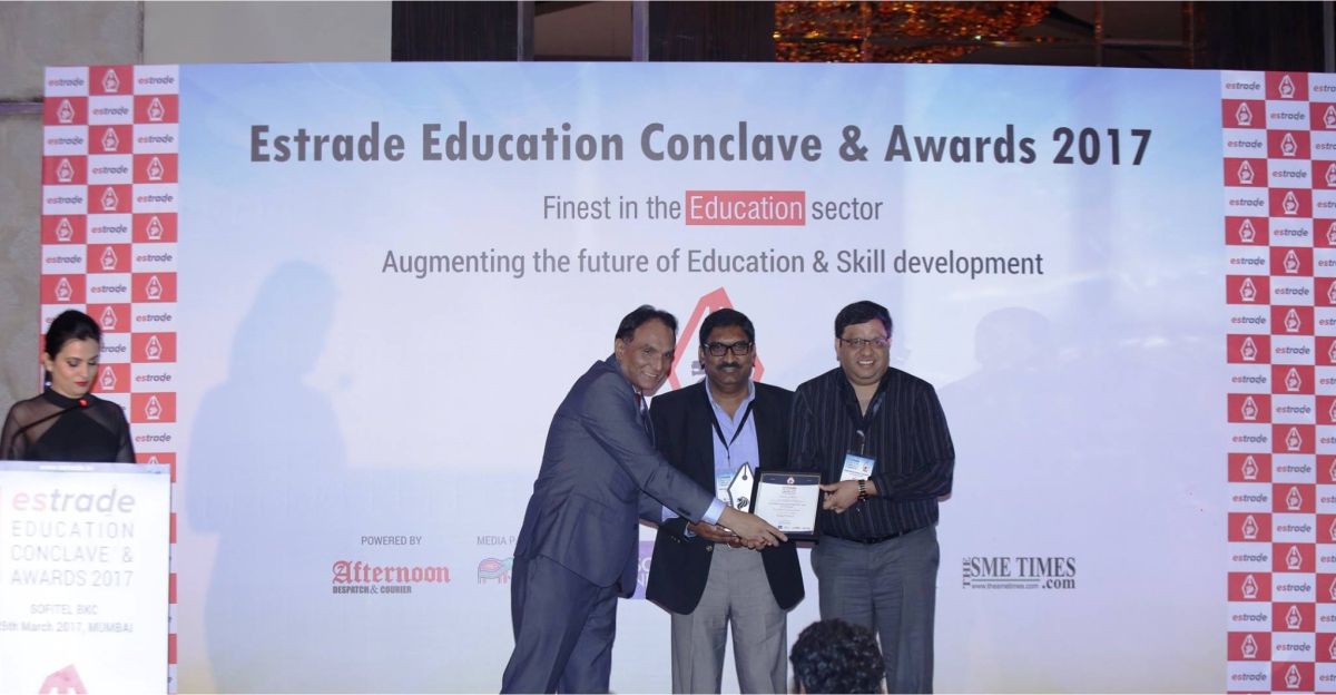 Mr. Arcot S. Ganesh, MD & Ganesh Akella, Finance Director - Smartkidz Educare India Pvt. Ltd. receiving award from Ashok Kumar, Founding Principal & MD - Gennex Partner